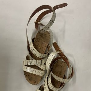 Rebecca mink off snake skin gladiator sandal.